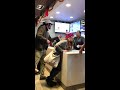 Lady goes crazy at McDonalds over a broken milkshake machine. (watch till the end)
