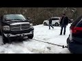 Minivan stuck in snow, 3 people try to pull him out!