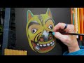 Drawing a Tiger Mask on Black Paper