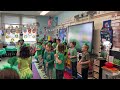 MRS DAVIS'S CLASS SINGS ON DAY OF GREEN
