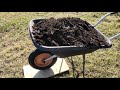 Foaming a wheel of a garden wheelbarrow correctly.