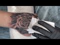 Rose on girls hand tattoo