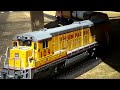 GE B23-7 locomotive back garden freight run.(HO)