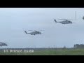 U.S. Marine Corps CH-53E Super Stallions and MV-22B Ospreys participate in a large scale air assault