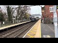 Freightliner Class 66 no. 66587 “AS ONE, WE CAN” passing through Ingatestone Station.