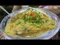 Mouthwatering Close-up of Claypot Grouper Head