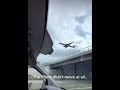 A plane stuck in the sky