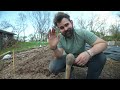 Starting a garden from scratch with traditional garden tools.