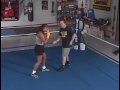 Freddie Roach teaches how to move and punch while keeping balance