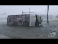 09-29-2022 Port Charlotte, FL - Blown Over Trucks, Flying Debris, Car Stranded In Floodwater