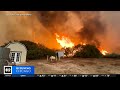 Red flag warnings still in effect for raging wildfires in Southern California