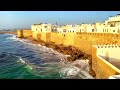 Very impressive landscapes in the Moroccan city of Asilah (video music) person walking