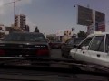 Mashhad, Iran Street Views From Inside a Taxi + Sounds of radio Mashhad