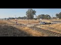 Melbourne-bound XPT at Table Top, NSW, Australia. ***HORN***