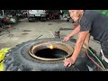 Car repair: How a talented mechanic changes the tire of a Doosan SD300 wheel loader