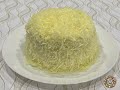 Fluffy Japanese Soufflé Cheesecake with silky Cream Cheese Frosting and generous shredded cheese