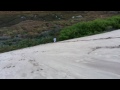 Ashley goes down a sand dune