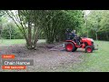 Outdoors clean up using a Kubota B2261 Compact Tractor and Front Flail Mower