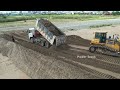 AMAZING SHANTUI DH17C3 BULLDOZER PUSHING SOIL WITH & DUMP TRUCK LANDFILLS UP.