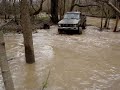 1980 toyota 4x4 going through mudd and deap water