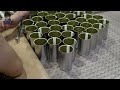 Spectacular production speeds.High speed mass production of empty cans in a Chinese canning factory
