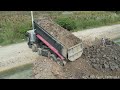 Incredible KOMATS'u Bulldozer Pushing And Big Dump Truck Unloading Soil Into Water