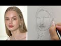 Learn to draw a beautiful girl's face step by step using the Loomis method