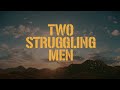TWO STRUGGLING MEN