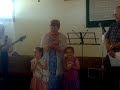 Wynne and Darryl Darulla and the twins at Bushnell Presbyterian Church service June 9