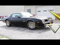 Driving an updated 1977 Pontiac Trans Am SE at V8 Speed and Resto Shop V8TV