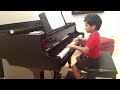 Lucciano spider boy playing piano