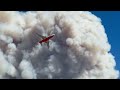 Tanker Drops Fire Retardant Over Post Fire