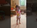 Lilli singing and dancing to skidamarink a dinky doo