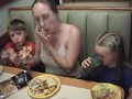 Kids eating pizza