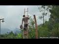 Fourth day of recovery after the storm. Villagers came to help rebuild the wooden bridge