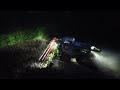 Harvesting Beans into the night with lexion combines