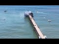 Drone video captures Oceanside Pier one day after fire