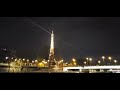 The Eiffel Tower sparkling at night (from Seine river cruise)