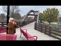 Walking Across The Tridge At Chippewassee Park In Midland, Michigan