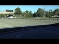 Supercars race down the highway in SoCal