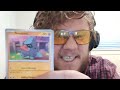 Opening Pokemon cards as an adult man.
