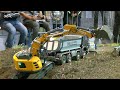 BEST OF STUCKING RC TRUCKS AND TRACTORS IN THE MUD - RC HYDRAULIC  MACHINES WORKING HARD