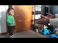Baby’s first steps and father’s priceless reaction.
