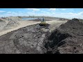 John Deere 210G Excavator Digging Frozen Peatmos