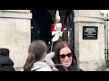ARMED OFFICER SHUTS UP THE SCREAMING GIRLS THE KING’S GUARDS