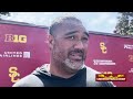 USC defensive ends coach Shaun Nua discusses his room after fifth fall camp practice