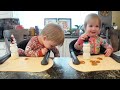Twins try chocolate covered pretzels