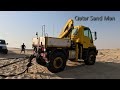 Mercedes Camper stuck in sand, in the Qatar desert, recovered by a Unimog 400.  سيلين , العديد