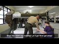 U.S. Marine tries to teach reporter how to make a military-style bed