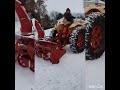 J.I. Case 830 clearing snow